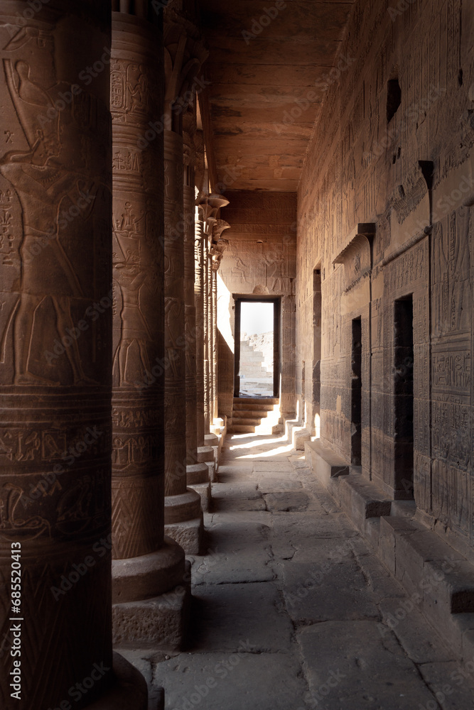 Columns covered with egyptian hieroglyphs in the Philae Temple