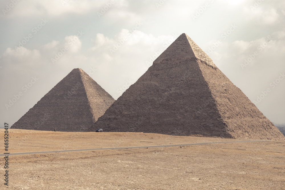 Two pyramids of Gyza during a sunny morning in Cairo.