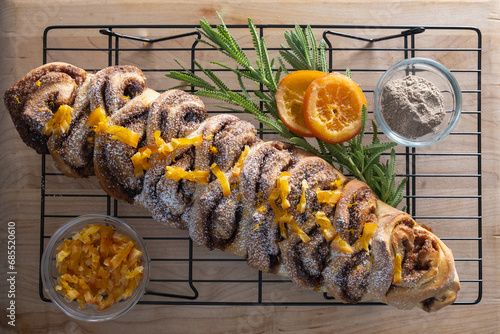 Overhead shot of sweet cardamom bread on cooling rack. photo