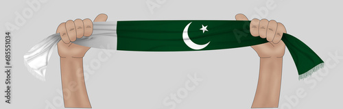 3D illustration. Hand holding flag of Pakistan on a fabric ribbon background.