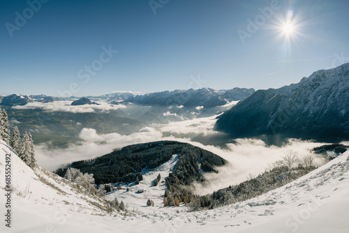 Blick von der verschneiten Rossfeld Panorama Straße nach Österreich ins Salzburger Land photo