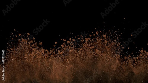 Super Slow Motion Shot of Soil Explosion Isolated on Black Background at 1000fps. photo