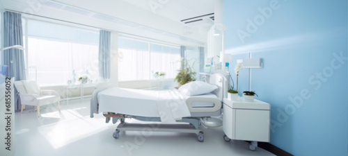Empty Hospital bed specially designed for hospitalized patients  Hospital equipment  clean and modern  in the new medical center  Recovery Room comfortable medical  health concept  blurred image