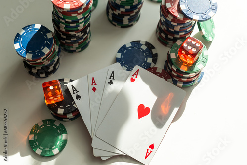 Gambling Poker Cards and Money Coins Photo