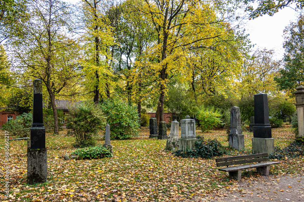 Autumn view of famous Old North Cemetery of Munich, Germany with historic gravestones. Autumn view of famous Old North Cemetery of Munich, Germany with historic gravestones.