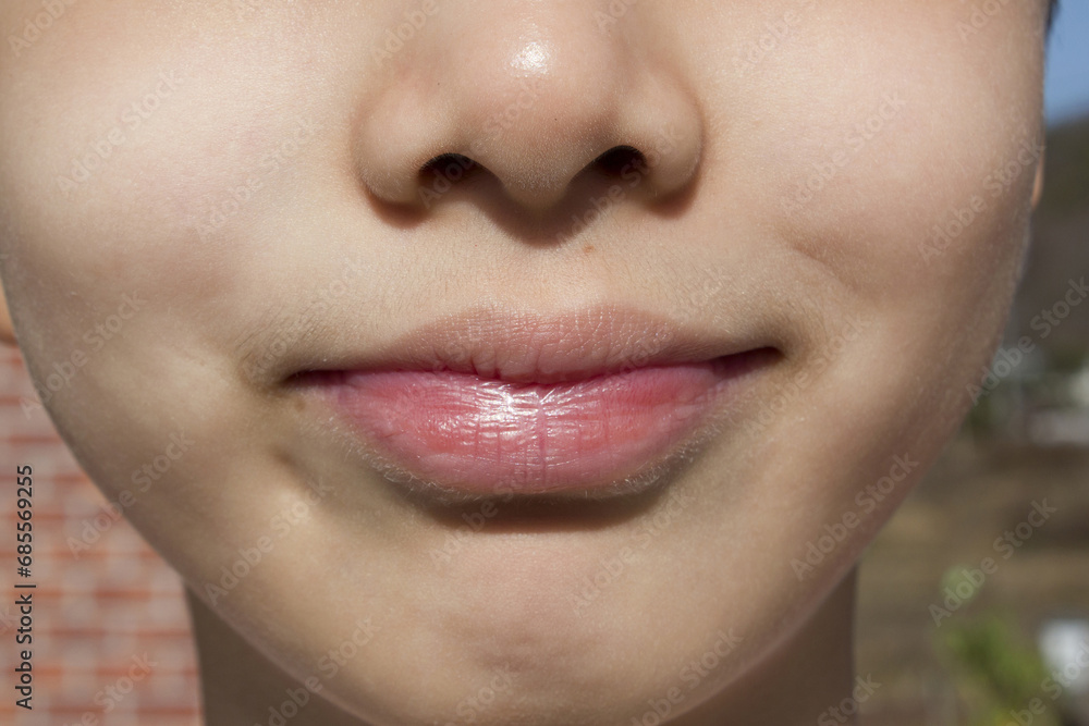 Naklejka premium It is a smiling face of an Asian child.