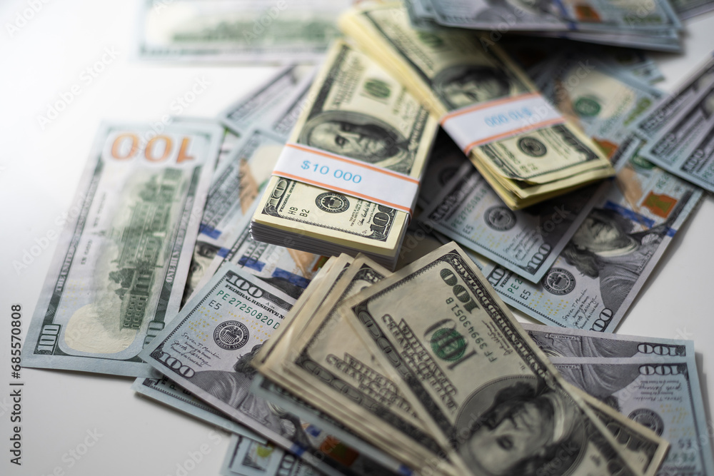 Cash money in a large pile as a finance background. Paper money close up. Top view. Cash money in a large pile as a finance background. Paper money close up. Top view.
