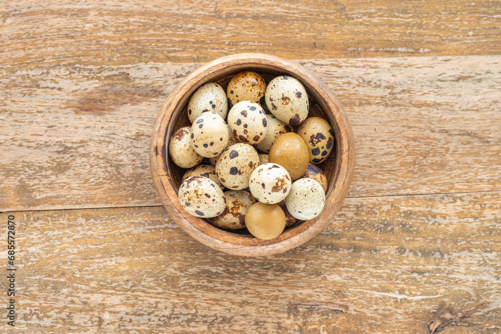 Quail eggs on wooden background. Quail eggs on wooden background.