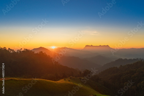 Beautiful Sunrise over Doi Luang Chiang Dao mountain at Hadubi camping viewpoint, Wiang Haeng district ,Chiang Mai province, Thailand.
