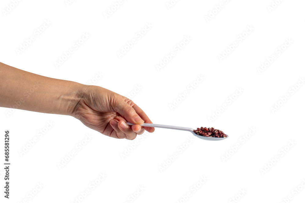 Red beans isolated on spoon plastic in hand on transparent background Red beans isolated on spoon plastic in hand on transparent background