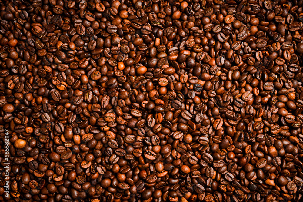 Arabica or Robusta coffee beans. Coffee background. Free space for text. Top view. Arabica or Robusta coffee beans. Coffee background. Free space for text. Top view.