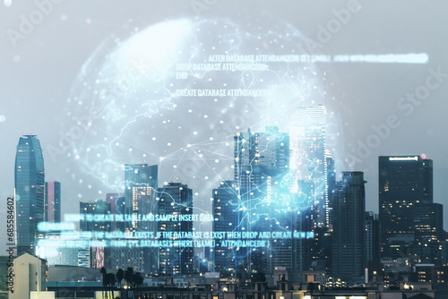 Double exposure of abstract programming language hologram and world map on Los Angeles city skyscrapers background, research and development concept © Pixels Hunter