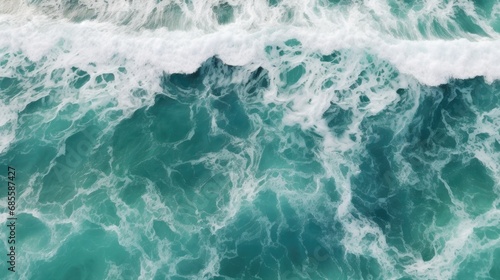 Spectacular aerial top view background photo of ocean sea water white wave splashing in the deep sea. Drone photo backdrop of sea wave in bird eye waves.