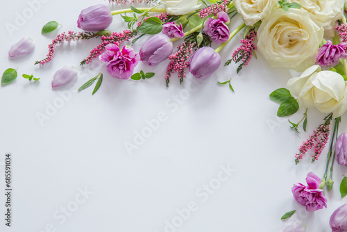 frame of beautiful flowers on white background