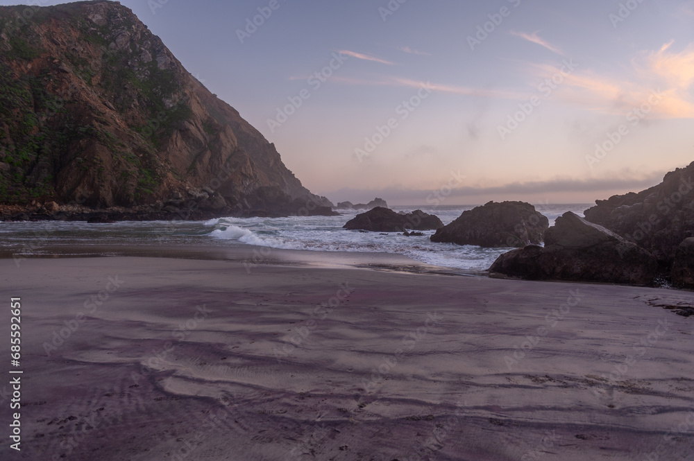 Sunset at Pfeiffer Beach, near Big Sur, showing the keyhole rock.