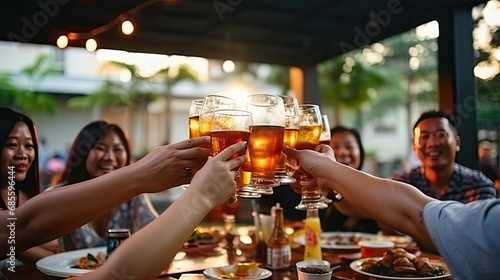 People in asian are celebrating the festival they clink glasses beer and dinner happy © Sasint