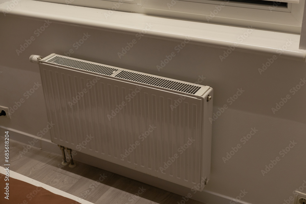 custom made wallpaper toronto digitalA steel panel heating radiator is placed under the windowsill on a white wall.