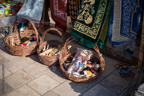 selling homemade dolls in this Citadel, Khiva, the Khoresm agricultural oasis, Citadel. photo