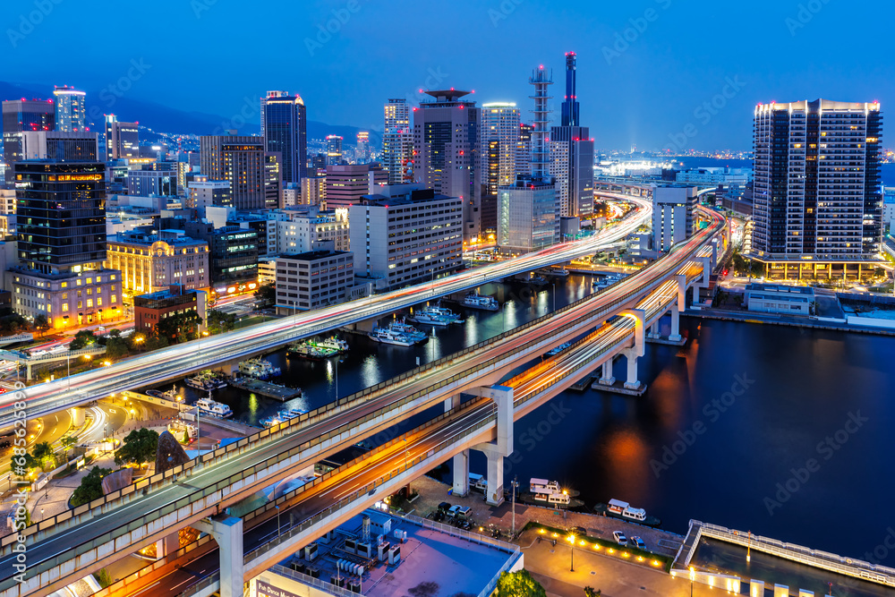 Fototapeta premium Kobe skyline from above with port and elevated road at twilight in Japan