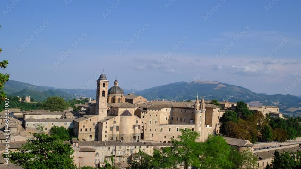 Panoramic view of Urbino and the surrounding countryside on a summer afternoon. Panoramic view of Urbino and the surrounding countryside on a summer afternoon.