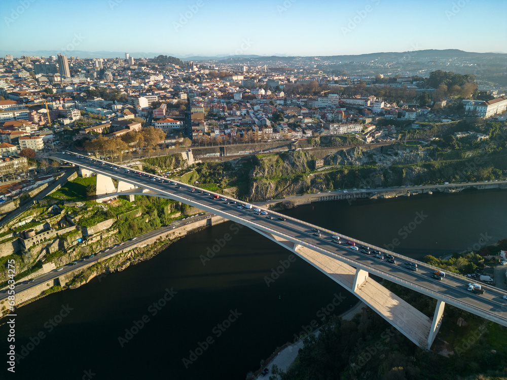 Portugal, bridges of Porto early morning after sunrise, aerial drone photo