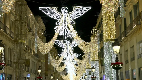 Angels on christmas lights decoration on Marqués  de  Larios street  in Malaga, Andalusia, Spain