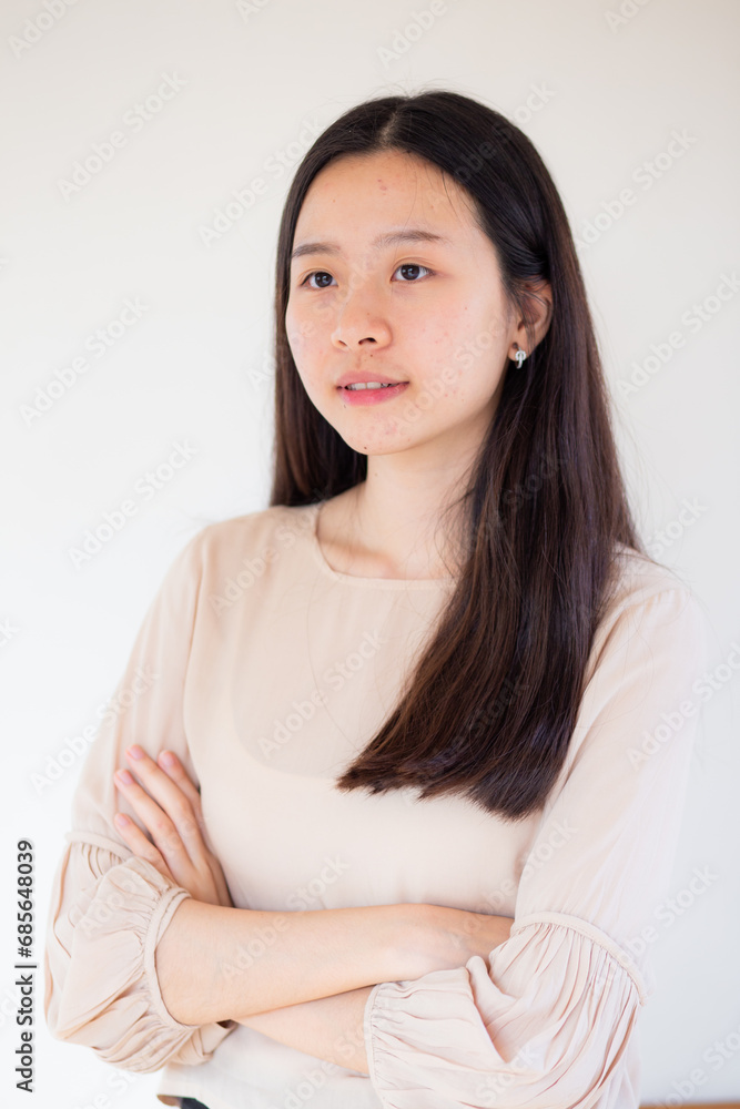 Beautiful asian long hair 20s woman portrait on white background Beautiful asian long hair 20s woman portrait on white background