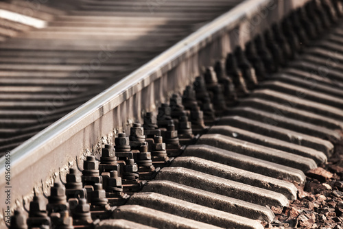 Close up view of a railway track details, photo with selective focus © evannovostro
