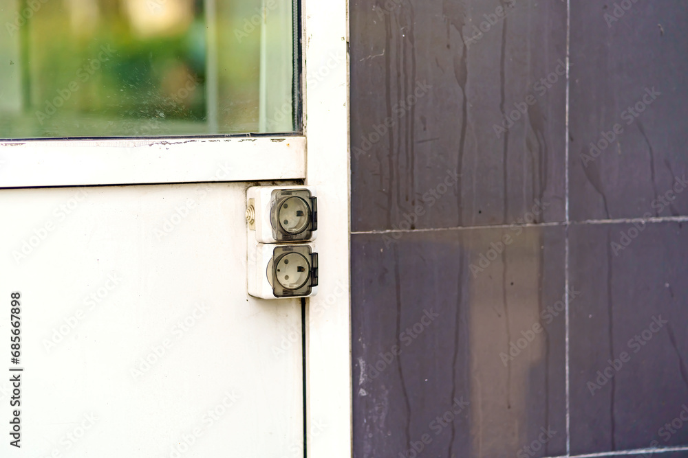 Electrical outlets on the outside of the door are protected from the elements Electrical outlets on the outside of the door are protected from the elements