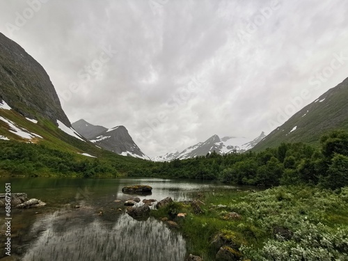 Glacial through - U shaped glacial valley in the Sunnmore Alps. Mountains in Norway. Alpine landforms

U-dal i Sunnmørealpene - Fjell i Norge. Alpint landskap. photo