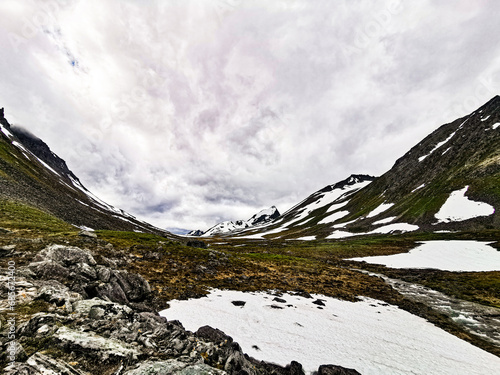 Glacial through - U shaped glacial valley in the Sunnmore Alps. Mountains in Norway. Alpine landforms

U-dal i Sunnmørealpene - Fjell i Norge. Alpint landskap. photo