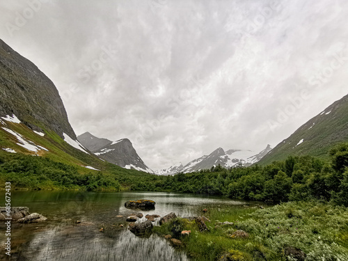 Glacial through - U shaped glacial valley in the Sunnmore Alps. Mountains in Norway. Alpine landformsU-dal i Sunnmørealpene - Fjell i Norge. Alpint landskap.