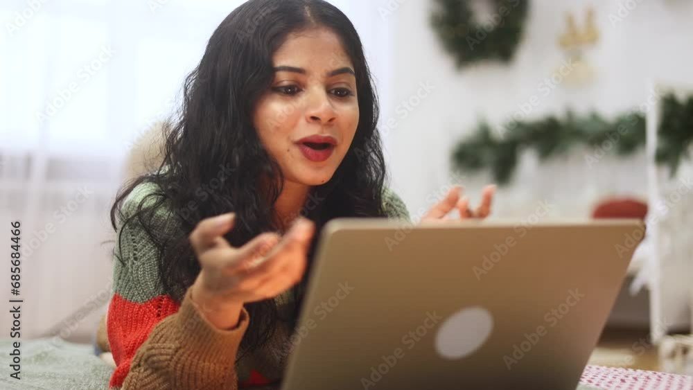 Portrait of beautiful young woman having video call conference meeting by laptop computer laying on bed at home Smiling female talking on personal conversation indoors Distance relationship concept Portrait of beautiful young woman having video call conference meeting by laptop computer laying on bed at home Smiling female talking on personal conversation indoors Distance relationship concept