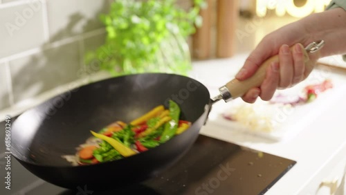 Frying vegetables in a Wok photo