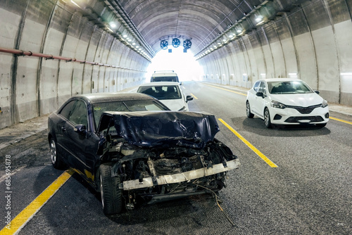Dangerous traffic accident inside a tunnel.
