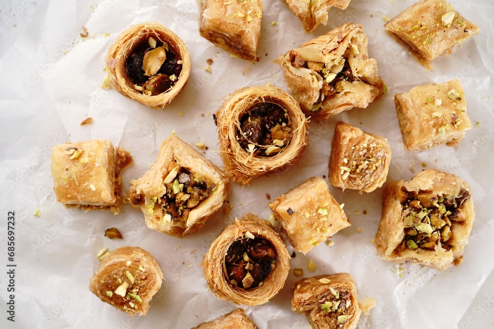 Assorted Baklava or baklawa topped with nuts, selective focus