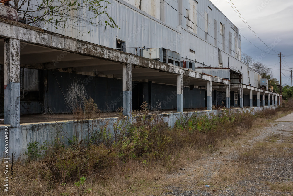 Remains of the loading dock of an abandoned factory in the rural south Remains of the loading dock of an abandoned factory in the rural south