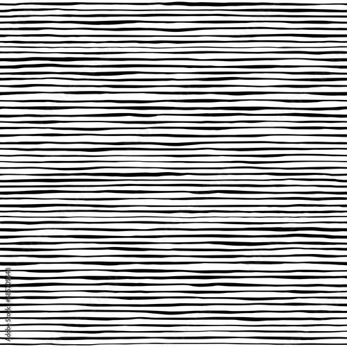 Waves seamless pattern. Hand drawn lines abstract background. Black and white stripes texture. Monochrome vector illustration
