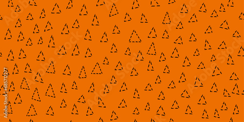 Pattern of dotted triangles. Vector pattern of primitive triangles. Seamless pattern for wallpaper and print surfaces.