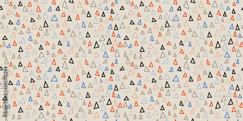 Pattern of different triangles. Vector pattern of primitive triangles. Seamless pattern for wallpaper and print surfaces.