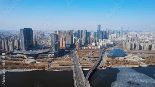 Aerial photography of Shengjing Theater and buildings along the Hun River in Shenyang, Liaoning, China photo