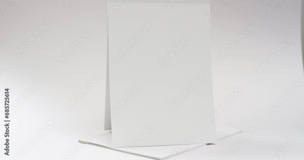 Video of books with white blank pages and copy space on white background Video of books with white blank pages and copy space on white background