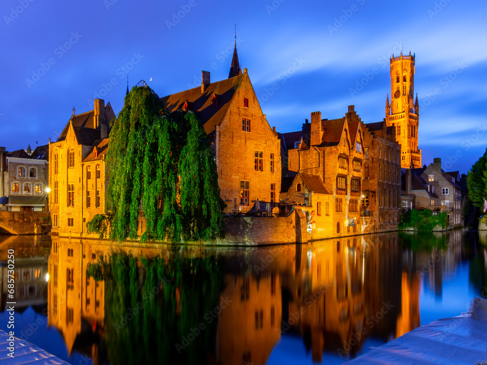 Brugge medieval architecture along Rozenhoedkaai canal at night, Bruges, Belgium Brugge medieval architecture along Rozenhoedkaai canal at night, Bruges, Belgium