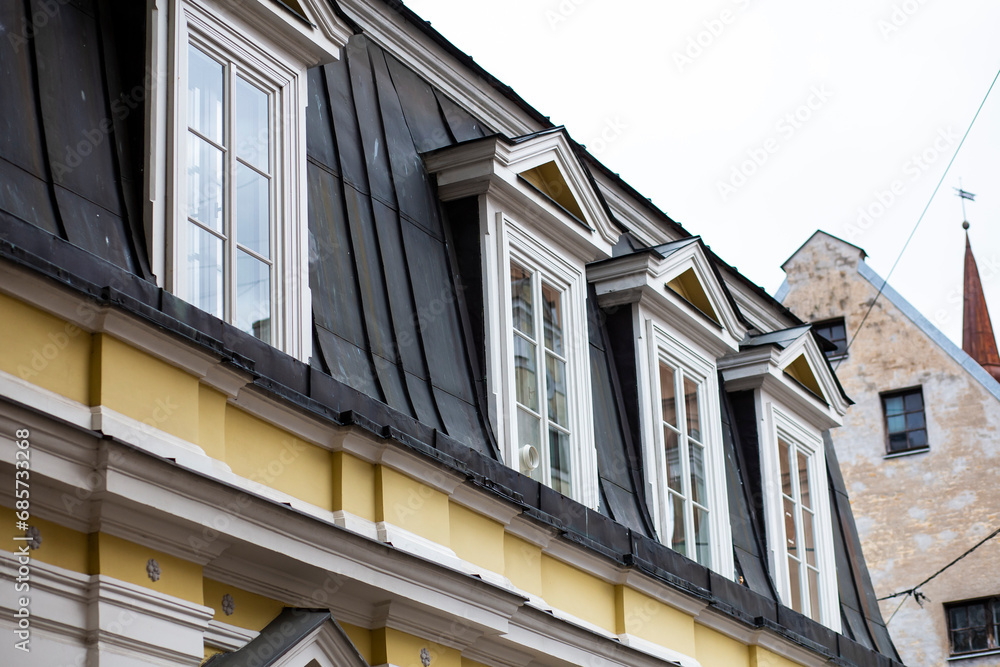 Roof windows in a typical old art nouveau building architecture in Riga, Latvia