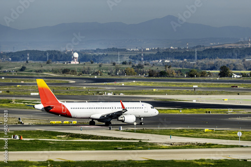 Airplanes transiting the runways approaching the takeoff area