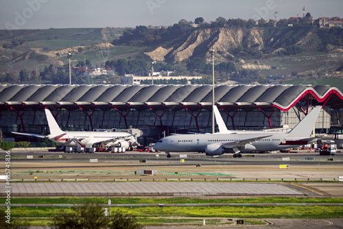 Planes transiting the runways near one of the terminals of Madrid Barajas airport photo