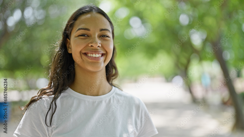 African american woman smiling confident standing at park African american woman smiling confident standing at park
