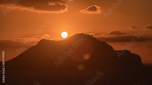 Sunset on Amorgos island aerial timelapse from above. Greece