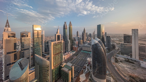 Skyline view of the high-rise buildings on Sheikh Zayed Road in Dubai aerial all day timelapse, UAE. photo