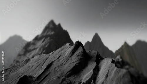 black mountains in blur abstract mountain landscape black and gray minimalistic gloomy black stone relief rocks 3d render photo